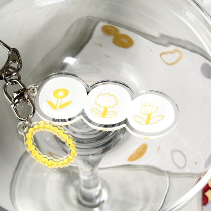 Rhythm of Circles Acrylic Keyring by Avocado Mori