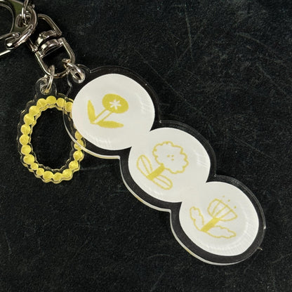 Rhythm of Circles Acrylic Keyring by Avocado Mori